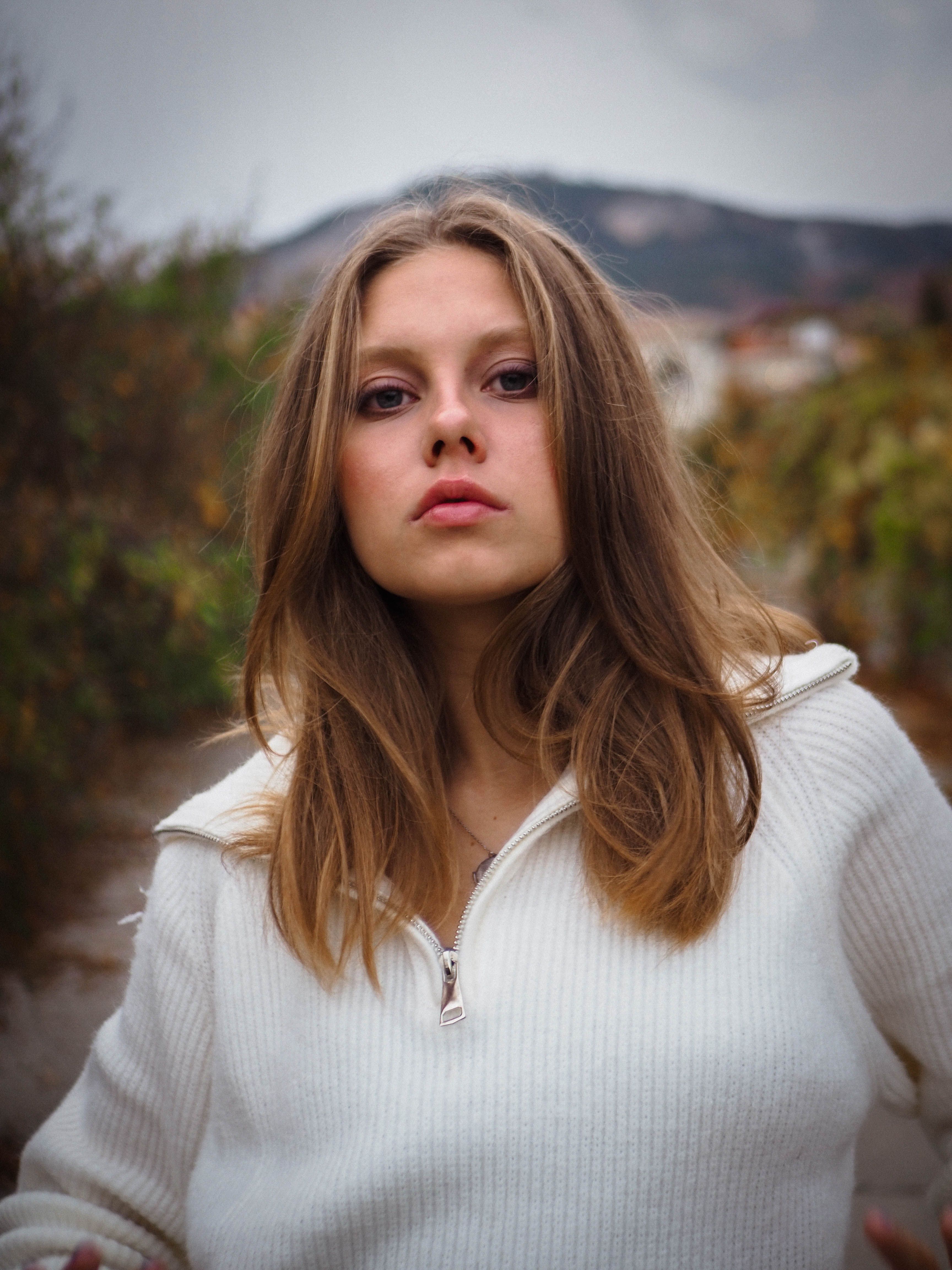 Blonde Woman in White Turtleneck Sweater with Zipper · Free Stock Photo