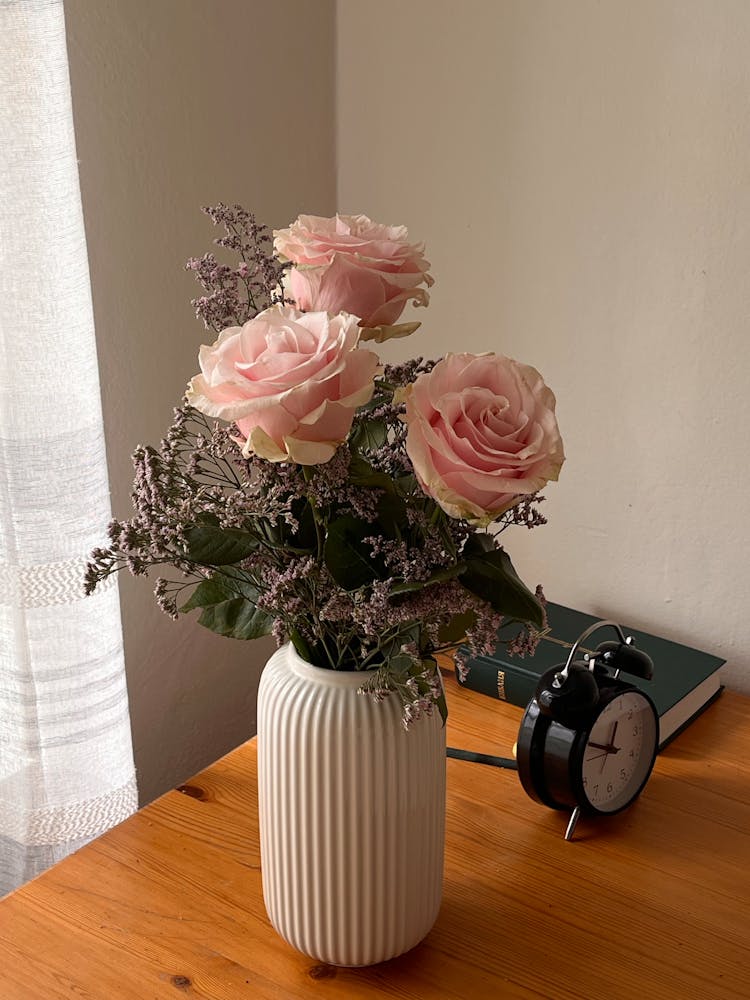 Bouquet Of Large Pink Roses In A Vase On The Desk