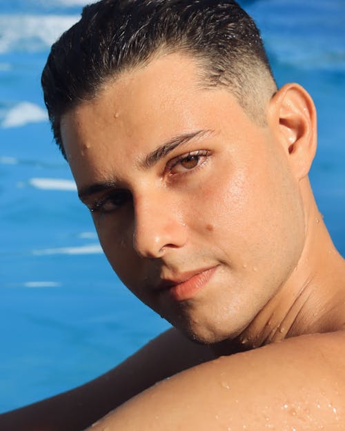 Portrait of a Young Man in a Swimming Pool 