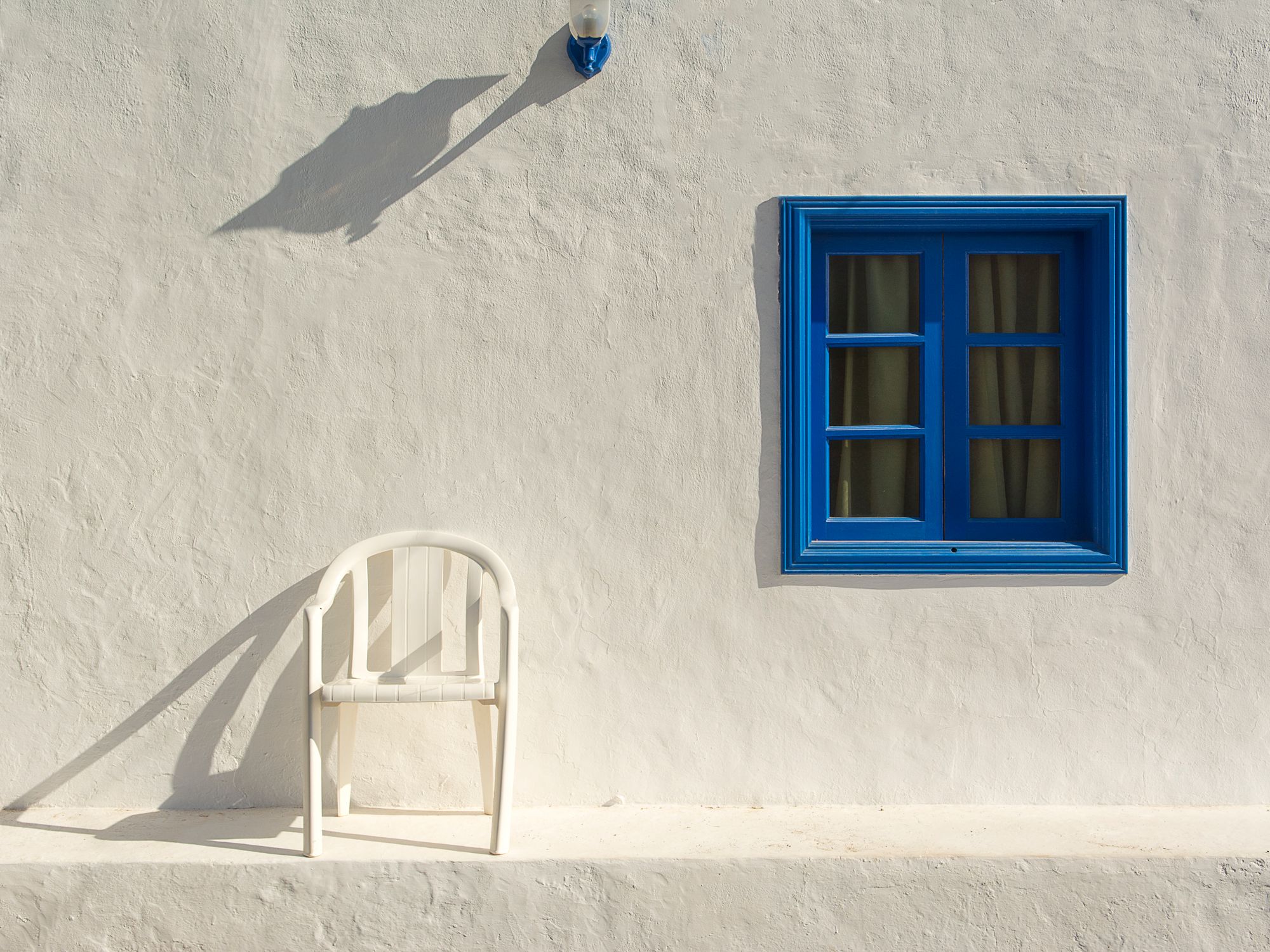 Exterior Painting in Dagenham, Barking and Dagenham — painter refreshing a house exterior in weatherproof paint