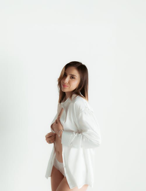 Woman Posing in White Shirt and Lingerie