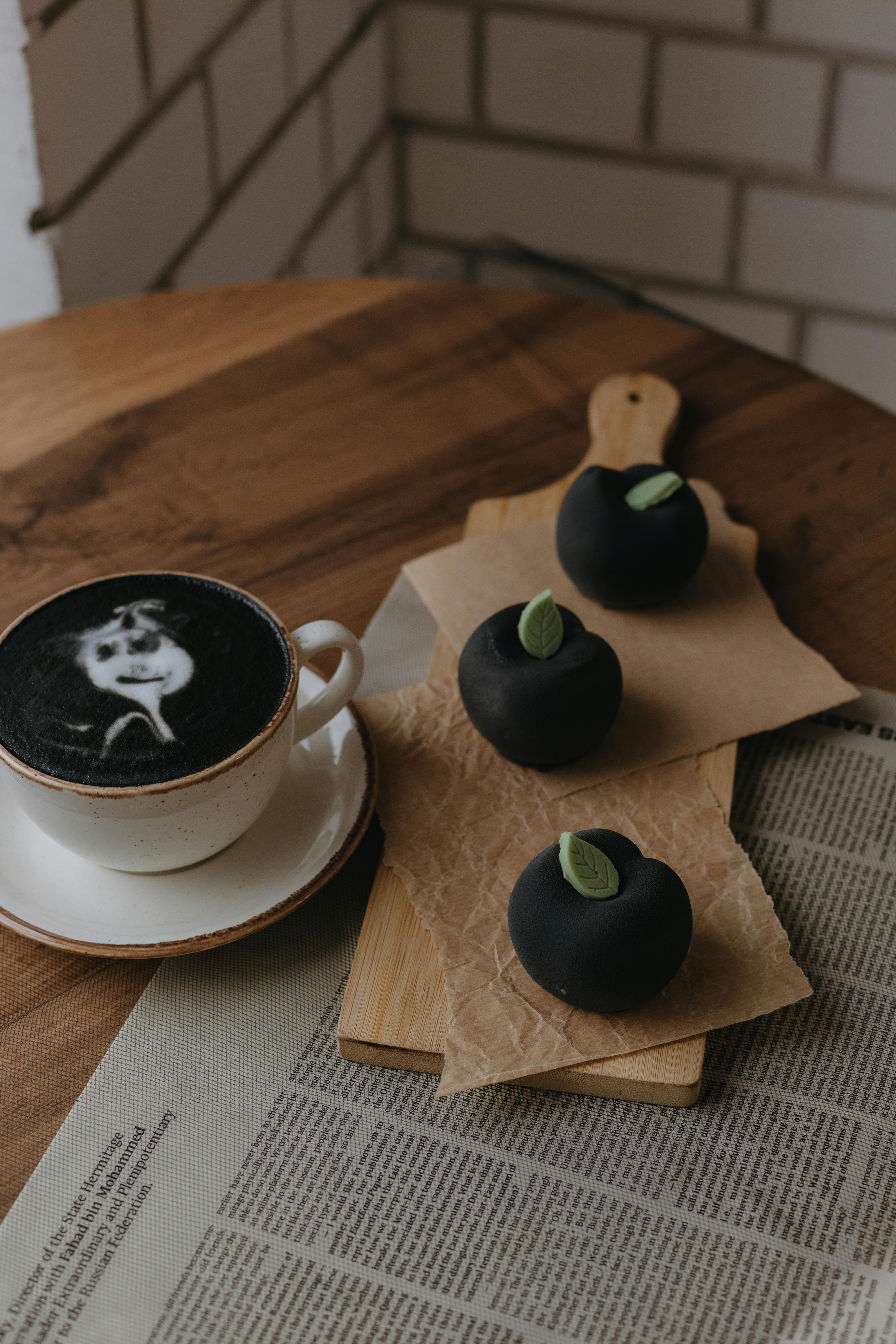 Cup of Black Coffee and Black Mochi Dessert · Free Stock Photo