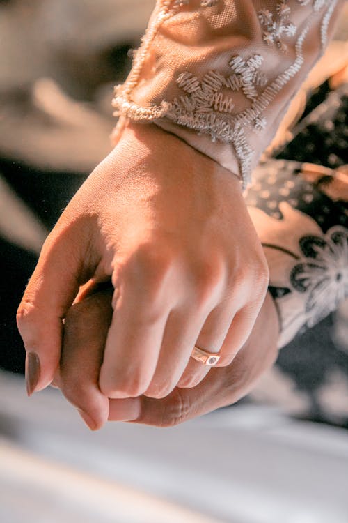 Hands of Newlywed Couple