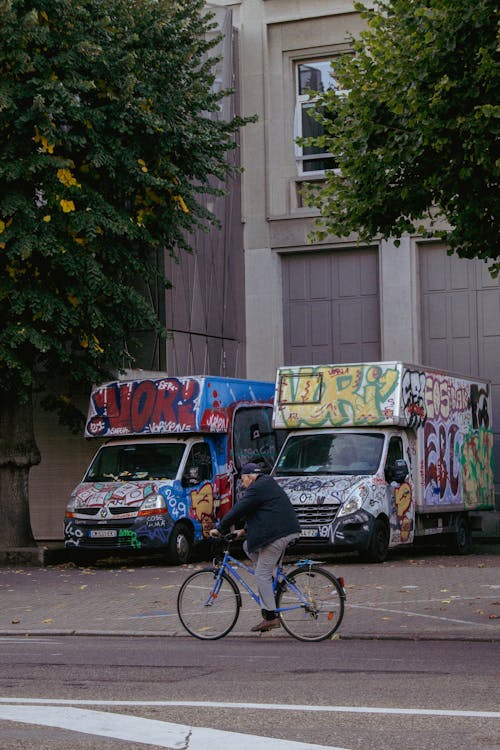 Elderly Man on Bike on Street