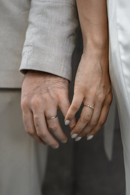 Hands of Newlywed Couple