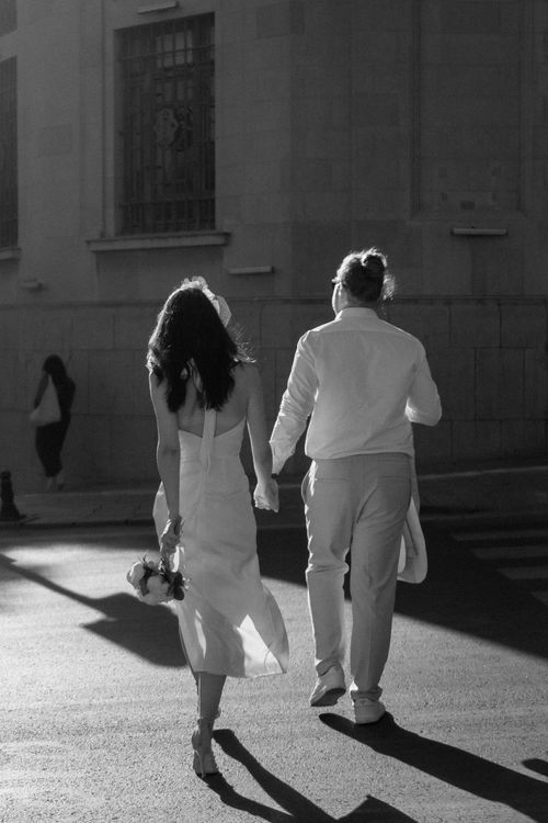 Back View of a Couple Crossing the Street · Free Stock Photo