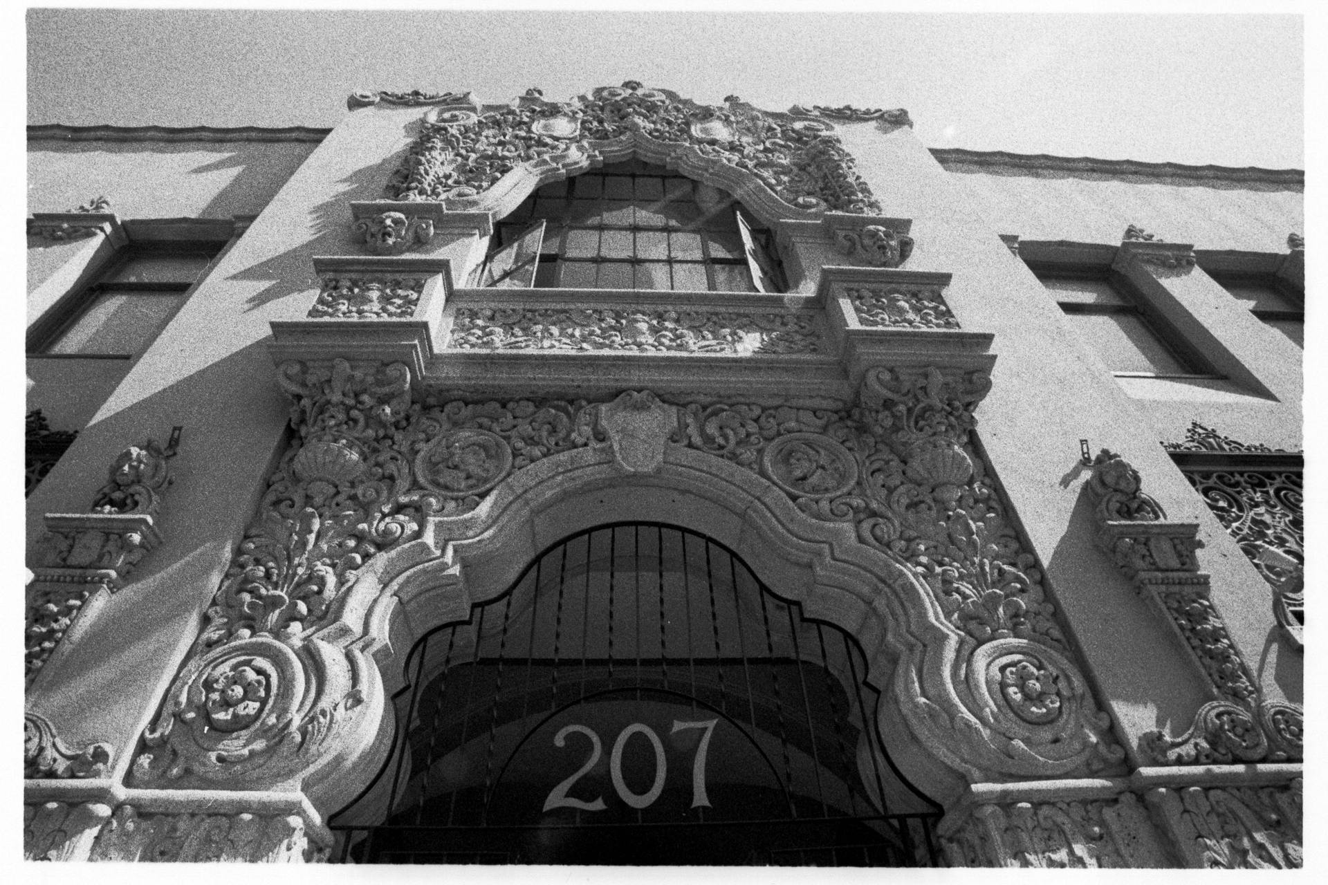 Black and white image of a detailed ornate facade in Santa Ana showcasing Moorish architecture.