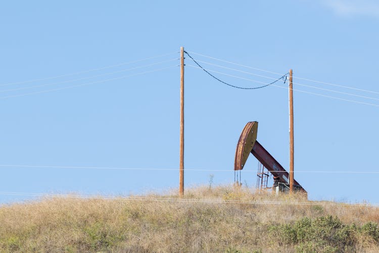 An Oil Well In A Field