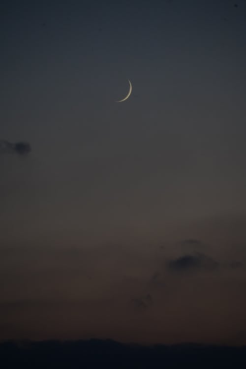 View of Crescent Moon on a Night Sky 