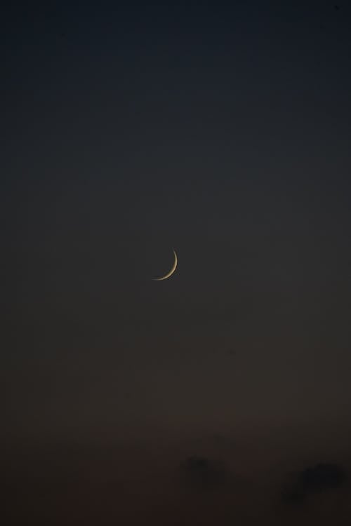 View of Crescent Moon on a Night Sky 