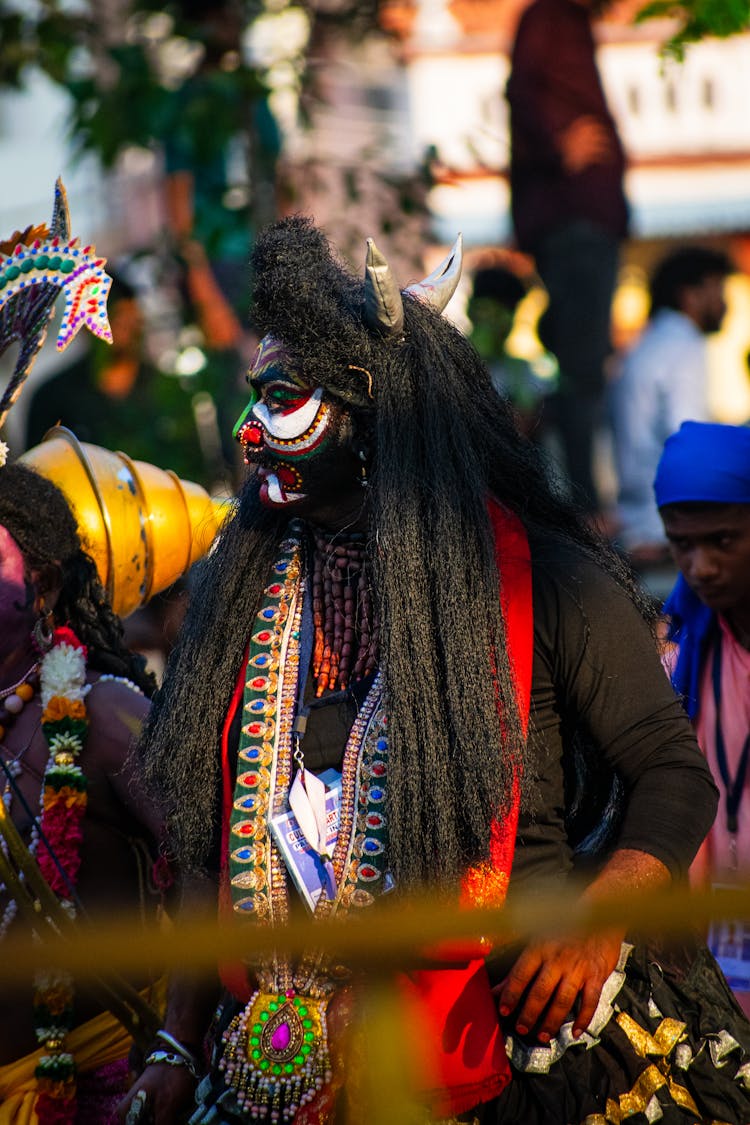 Person In Ritual Costume During Festival