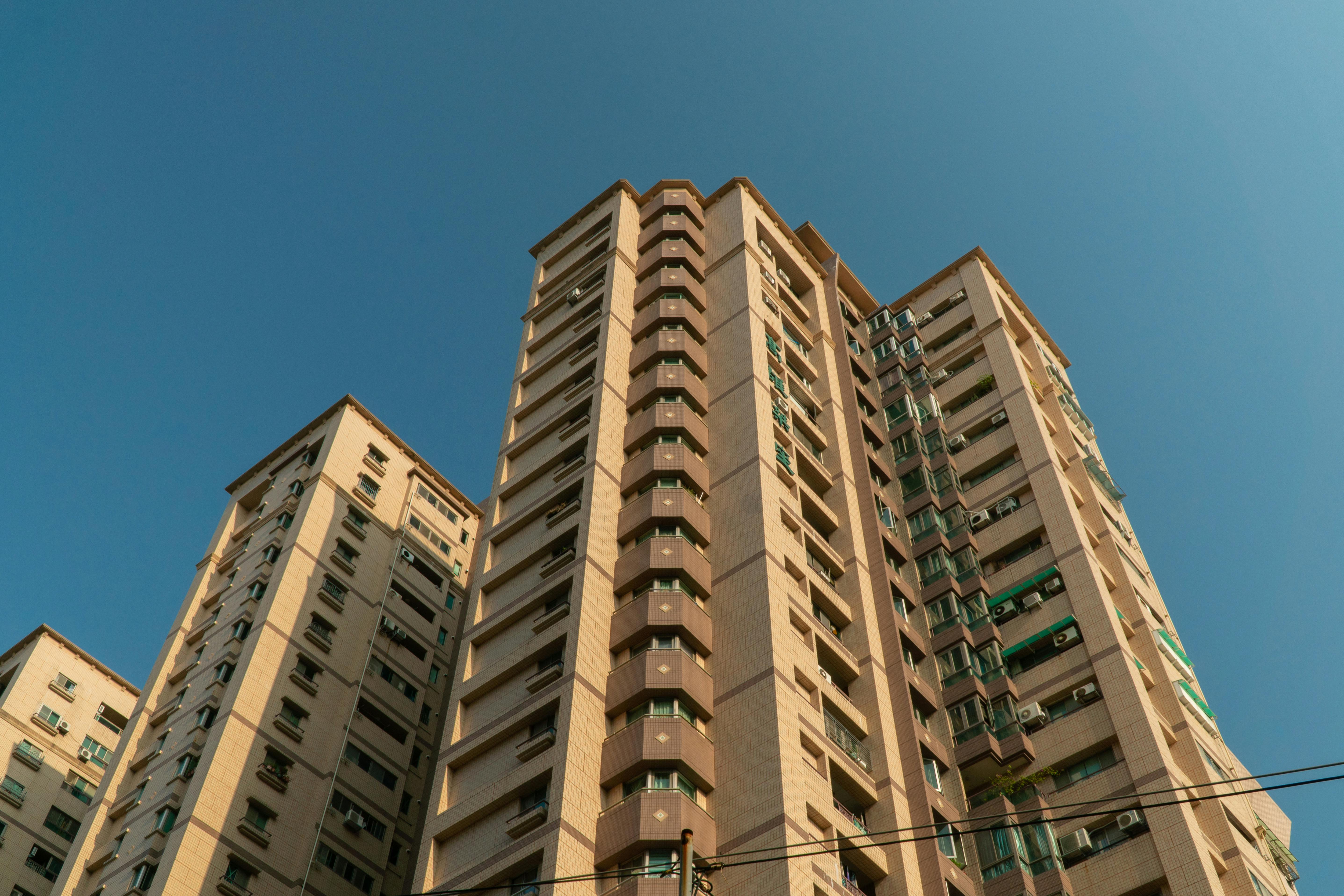 Free stock photo of apartment building, blue sky, buildings