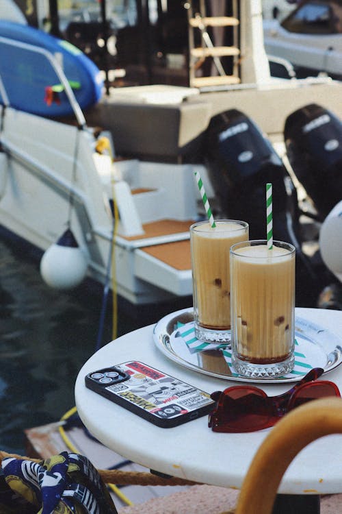 Coffee Glasses with Straws on Table