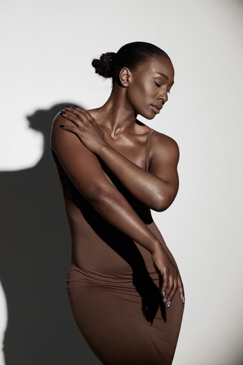 Female Model Wearing a Brown Dress