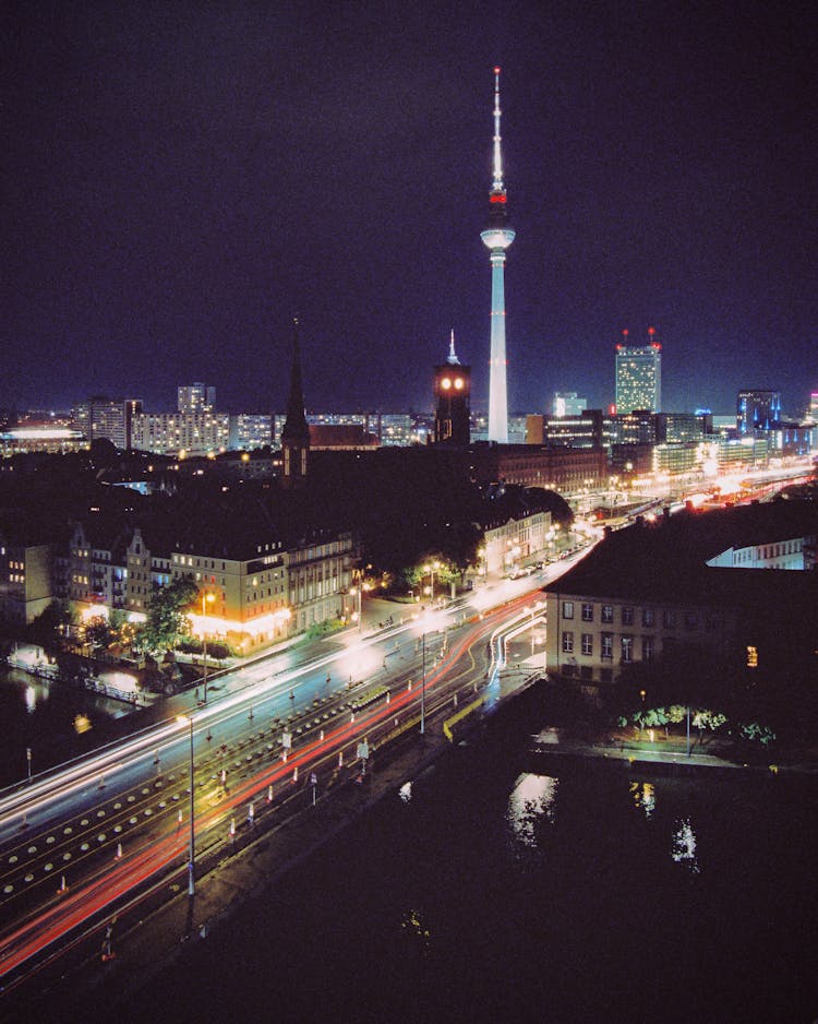 Mill Dam And TV Tower In Berlin At Night