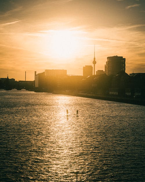 Skyline of Berlin seen from across the Spree River at Sunrise, Berlin, Germany 