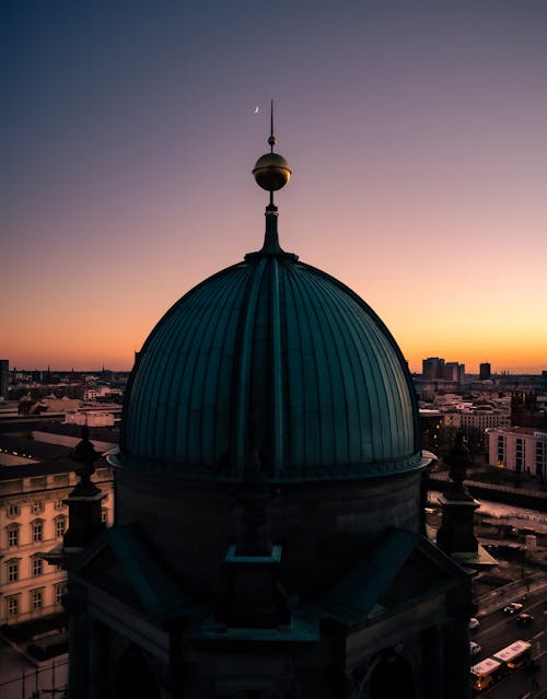 Building Dome in City at Sunset