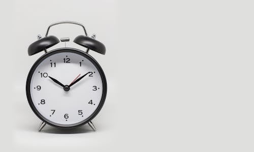 An Alarm Clock on a White Background