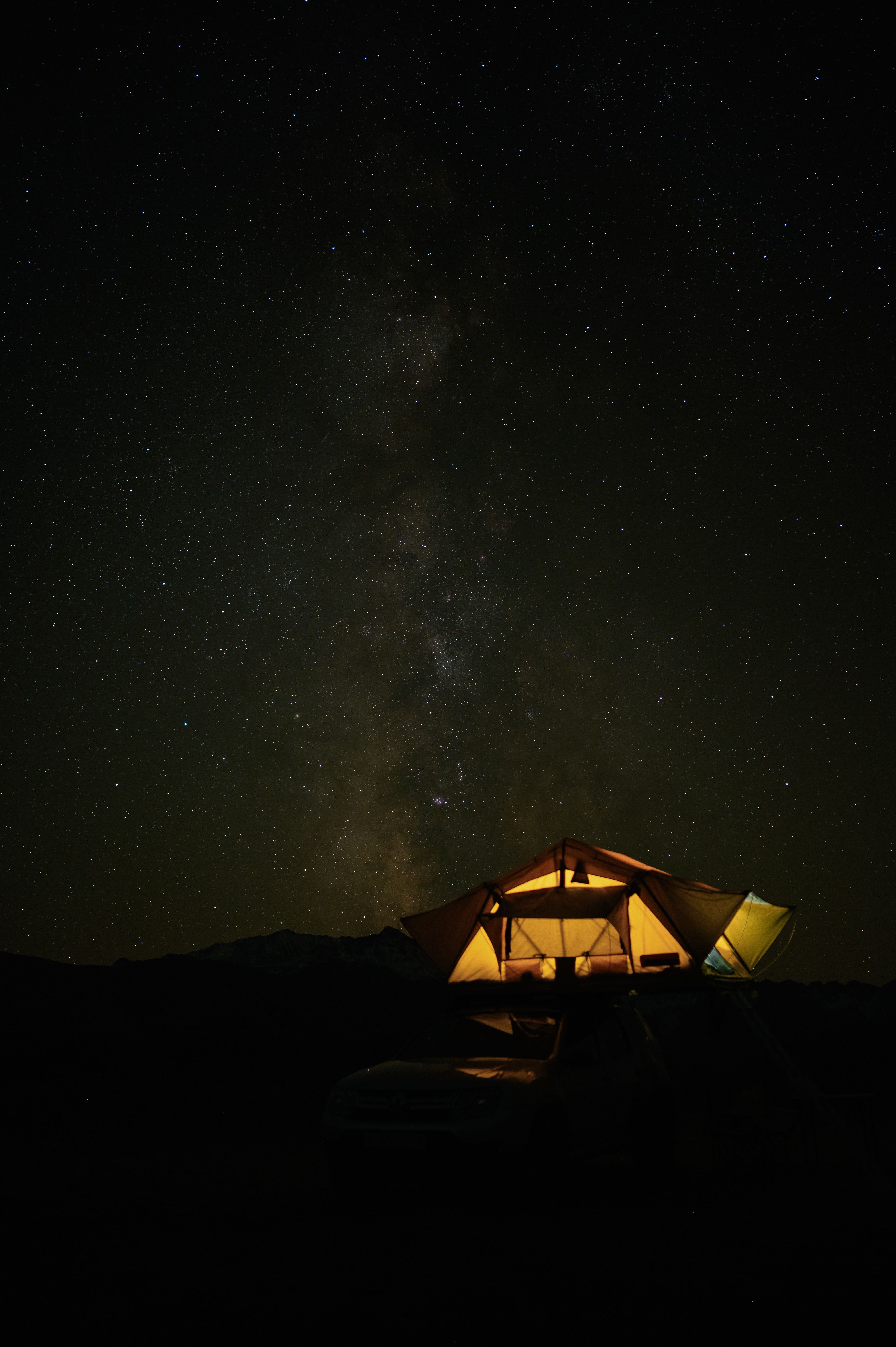 Canvas glamping tents under a starry sky near Yosemite National Park