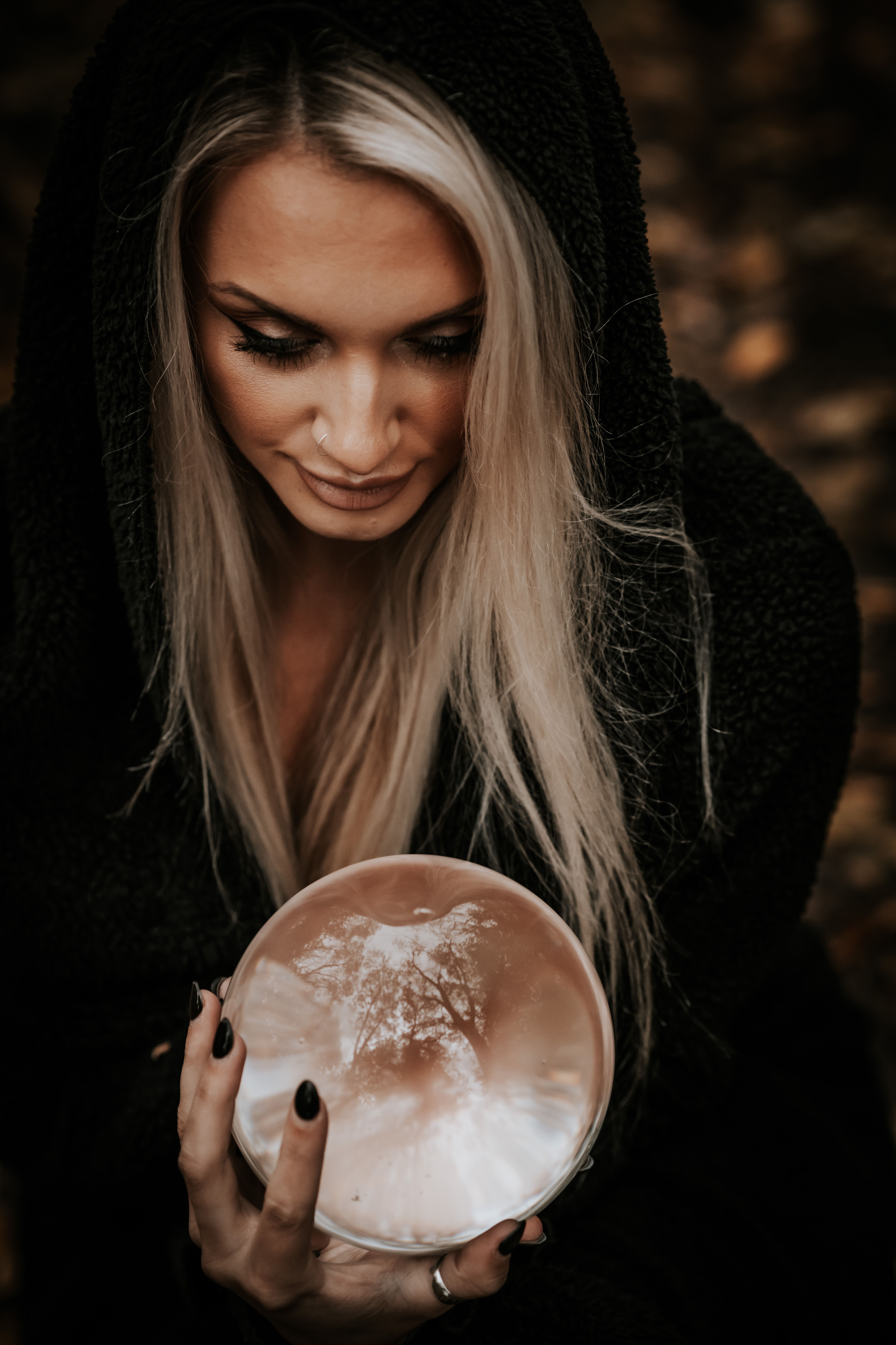 Blonde Woman Holding Crystal Ball · Free Stock Photo