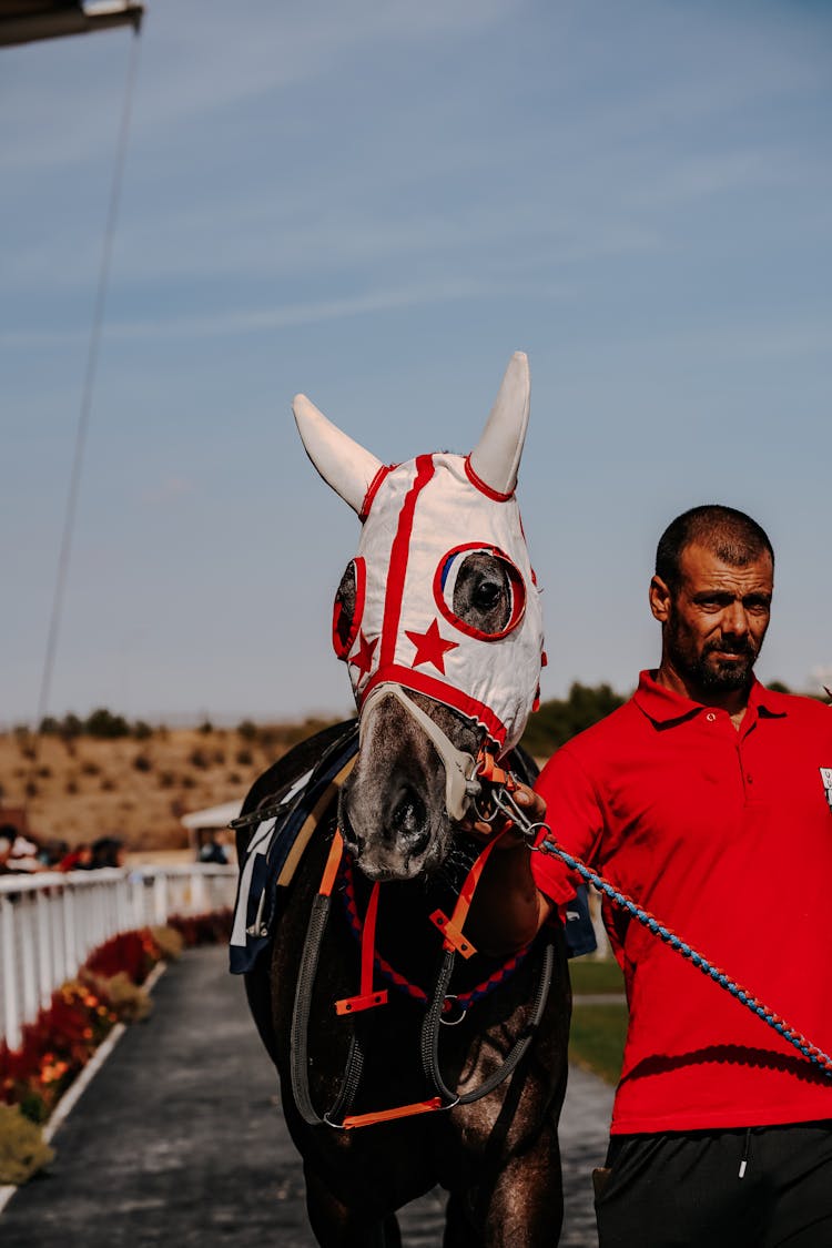 Man With A Horse On A Race 