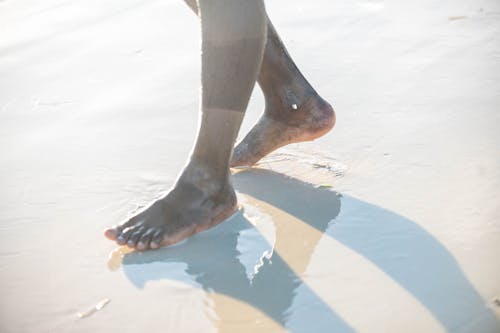 African feet on the beach