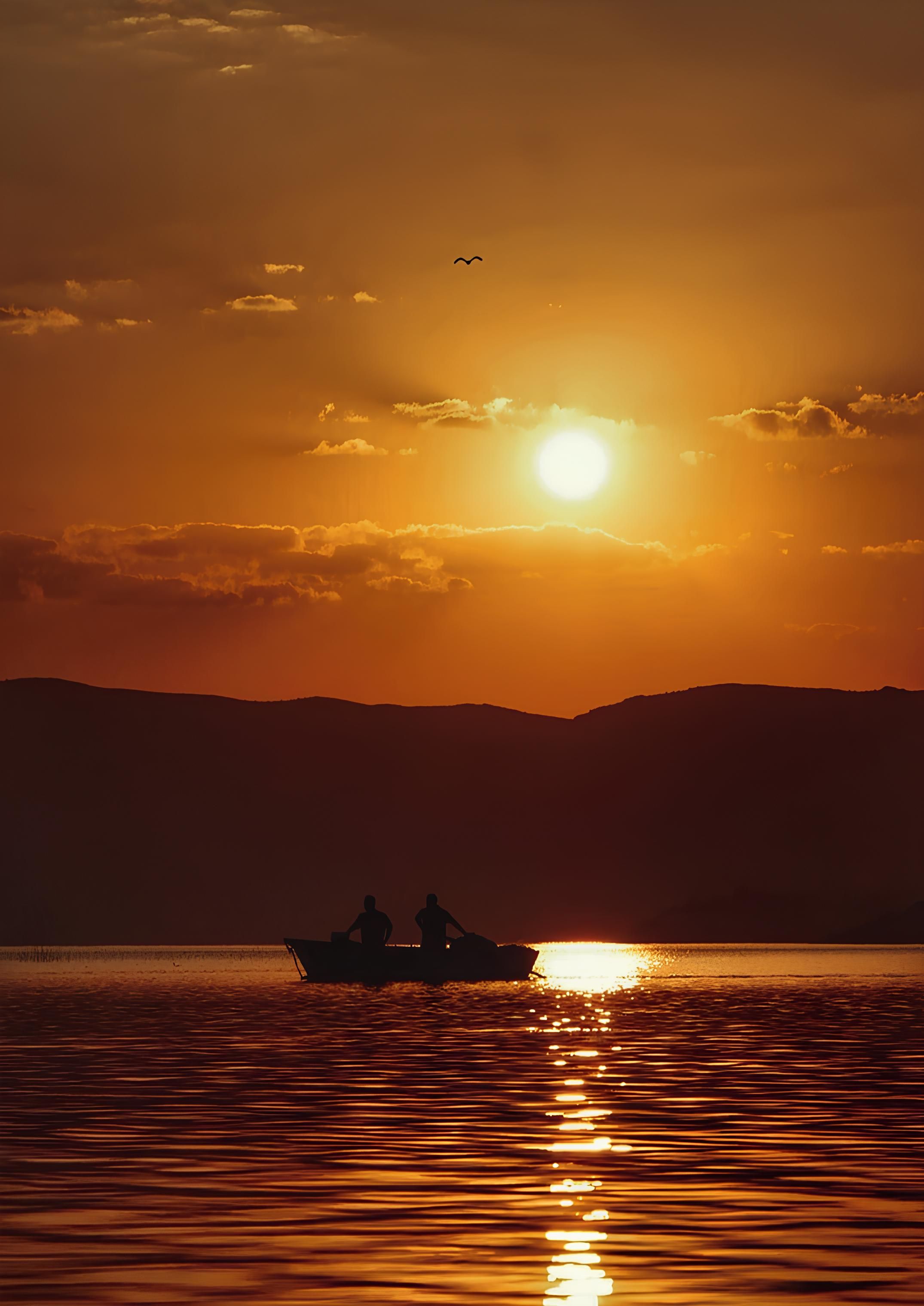 Silhouette of 2 People Riding on Boat on Lake during Sunset · Free ...