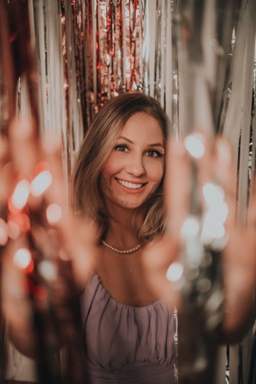 Portrait of a Pretty Blonde with Glitter on her Face