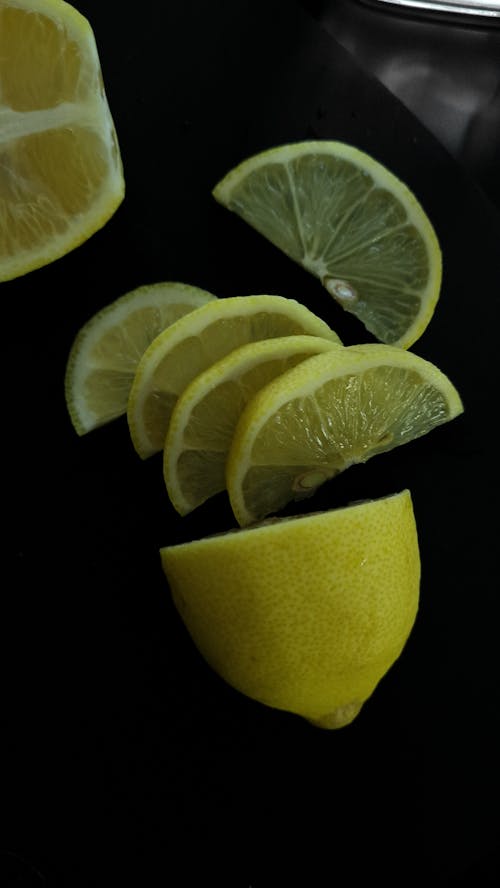 Sliced Lemon on Black Board