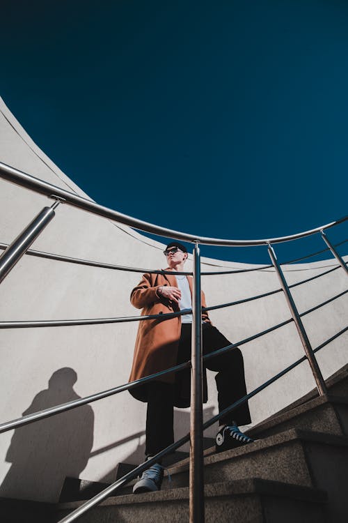 A Person Standing on a Staircase