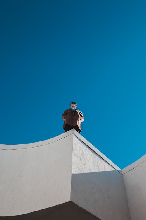 Person against Blue Sky