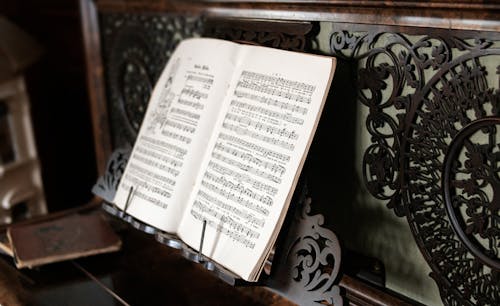 Free Musical Composition on Wooden Stand Stock Photo