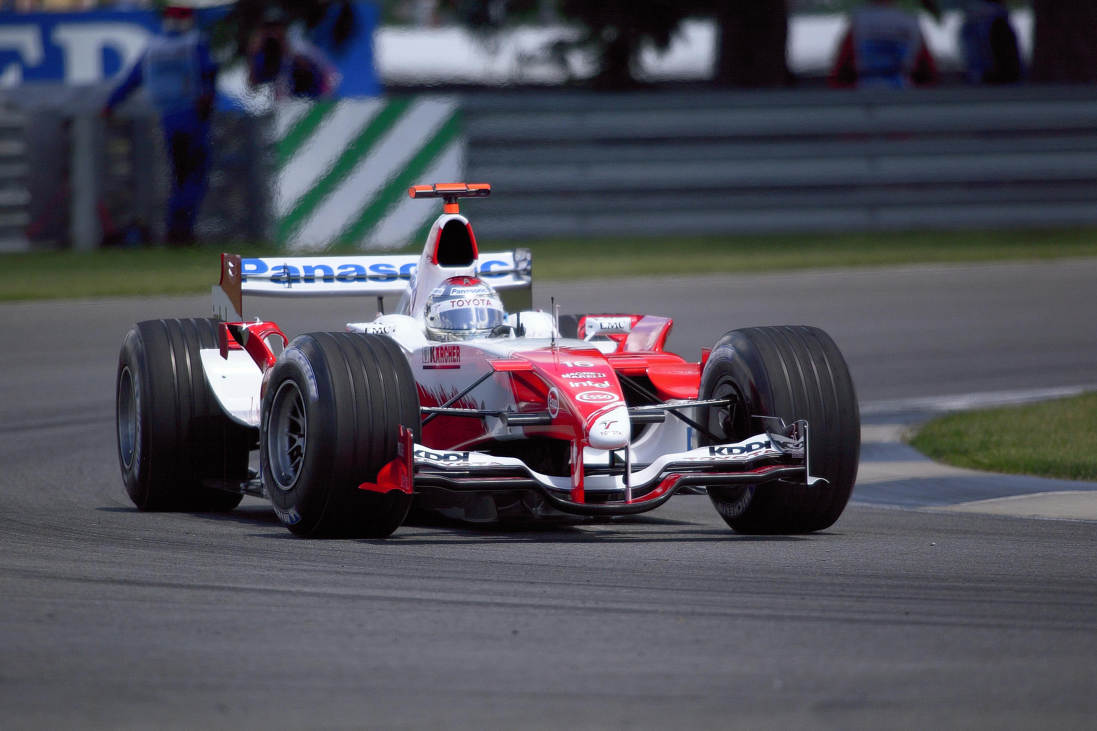 Red Racing Car on Race Track · Free Stock Photo