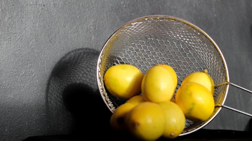 Lemons in Colander