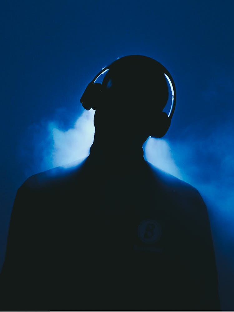 Silhouette Of A Man Wearing Headphones