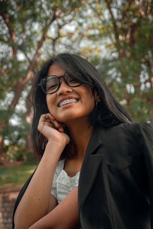 Smiling Brunette Woman in Eyeglasses