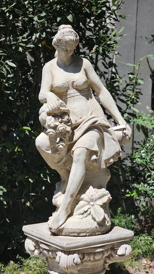 Marble Sculpture of Sitting Woman