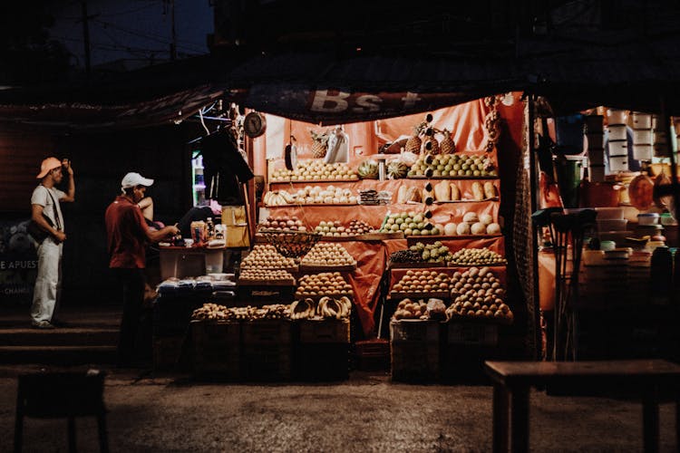 Bazaar By Night With Fruit On Display