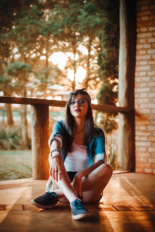 Woman Sitting on Floor