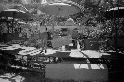 Woman Standing on Futuristic Installation