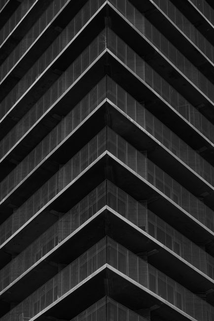 Striking abstract view of an urban office building with geometric patterns.