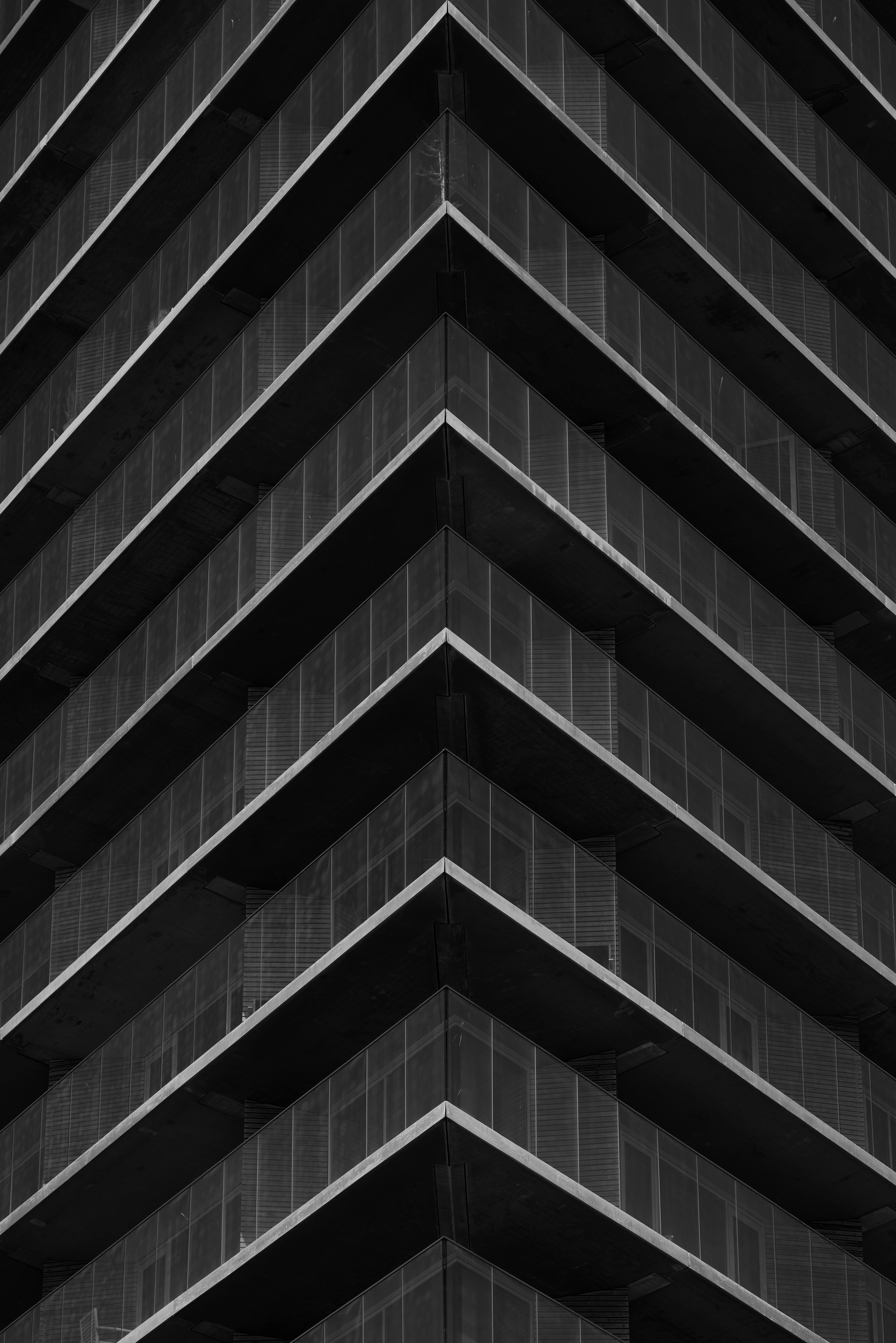 Free Striking abstract view of an urban office building with geometric patterns. Stock Photo