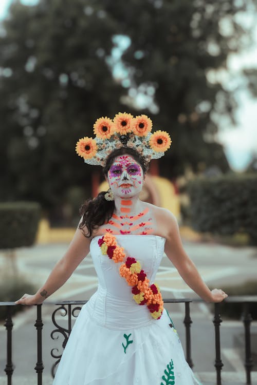 Woman Wearing Skull Makeup and a Dress for the Day of the Dead Celebrations in Mexico 