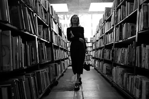 Woman in a Library in Black and White