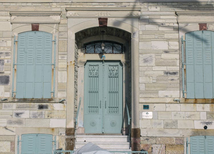 Vintage Doors And Shutters On House