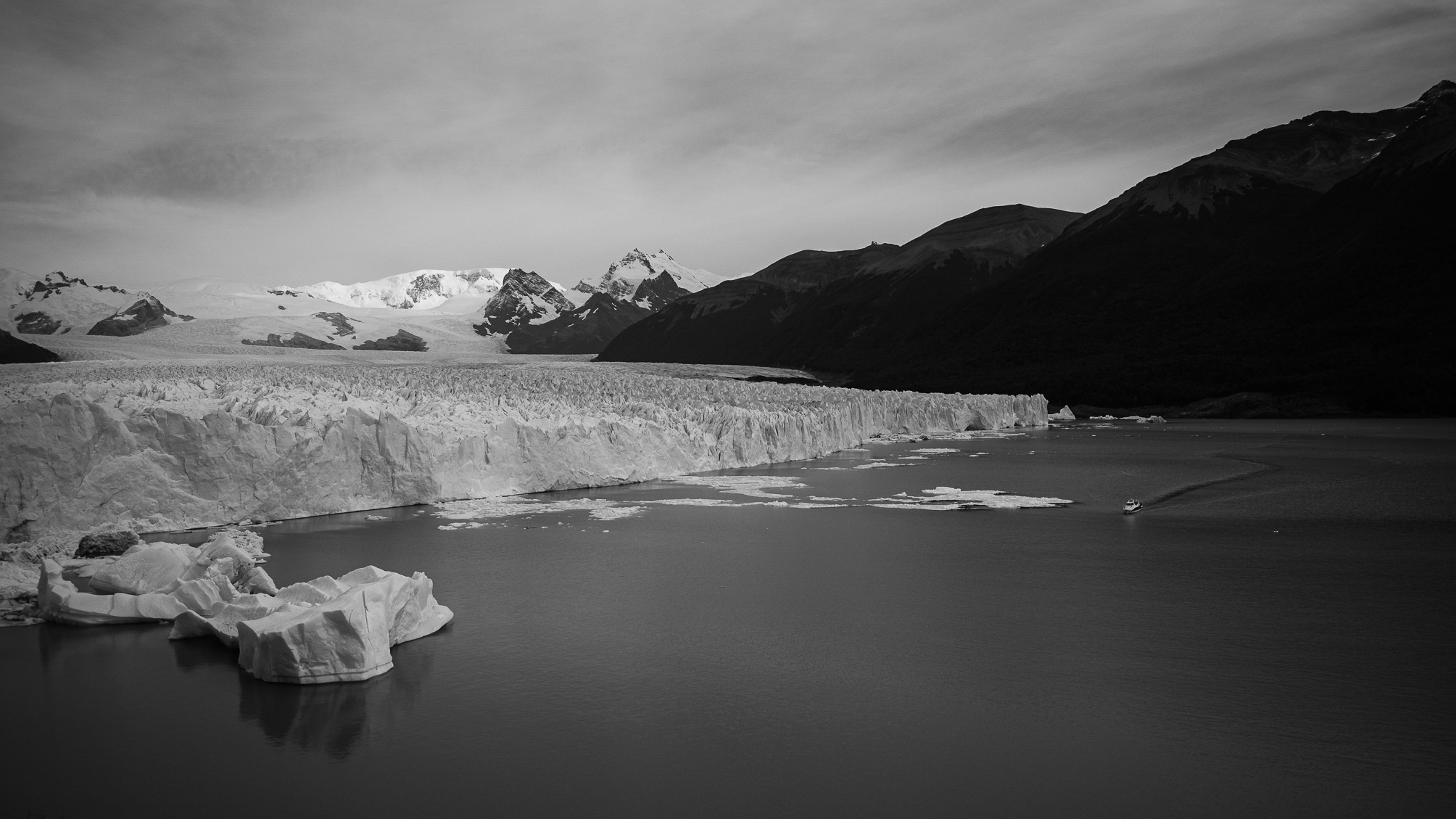 Explore the stunning Perito Moreno Glacier in El Calafate, Argentina, with towering ice formations and serene waters.