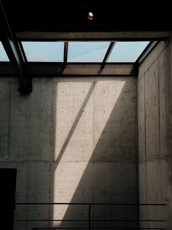 Concrete walls and skylight shadows — Felix Gutierrez on Pexels