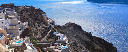 Ilmainen kuvapankkikuva tunnisteilla arkkitehtuuri, santorini, sininen meri