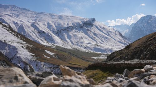Free Stunning view of snow-covered mountains and valleys in Kashmir, India, showcasing winter serenity. Stock Photo