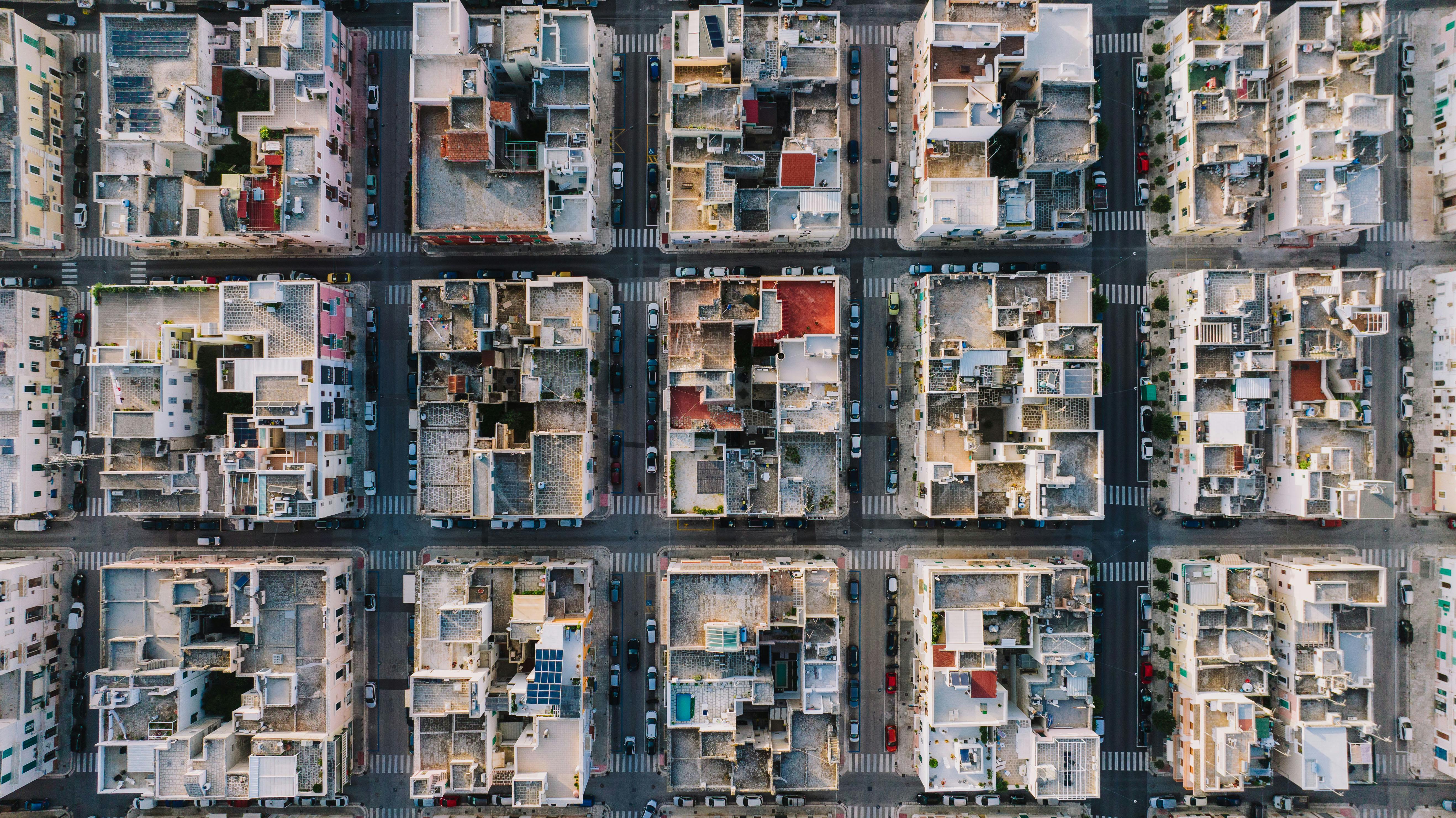 High-altitude aerial photo showing grid layout of Monopoli, Italy's residential district.